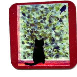 Black cat coaster with a cute cat watching a bird in the bushes