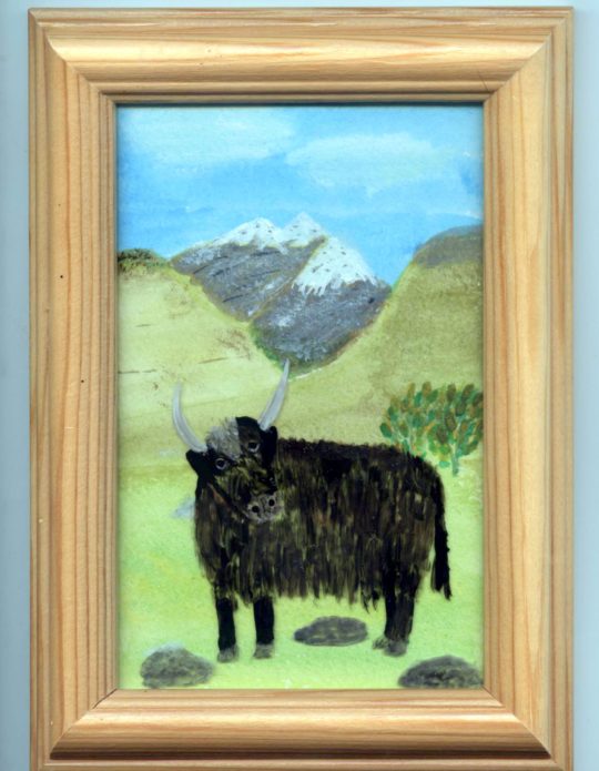 Small painting of a yak in the mountains.