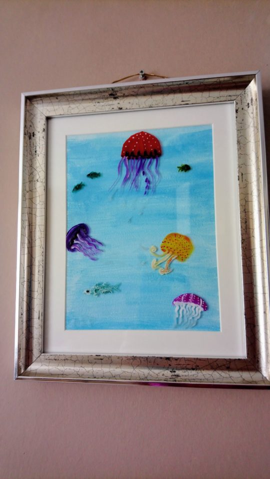 Jellyfish glass painting with a blue acrylic background