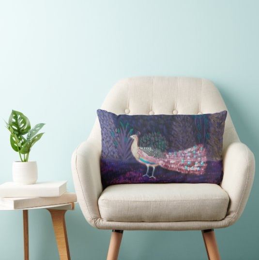 Peacock cushion with a colourful illustration of a peacock in a purple garden