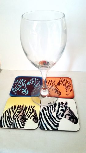 Set of 4 coasters with zebra artwork and a wine glass