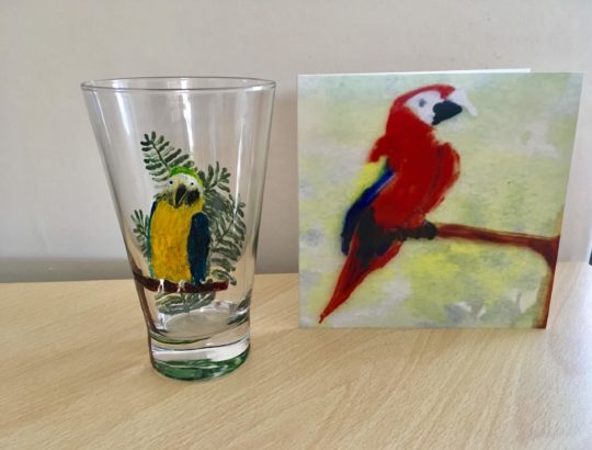 Macaw parrot card photographed with an original parrot glass paintnig