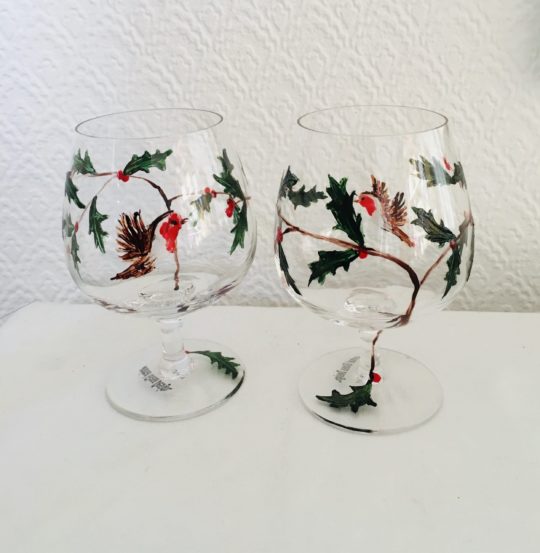 Two hand painted brandy glasses with Robins and holly