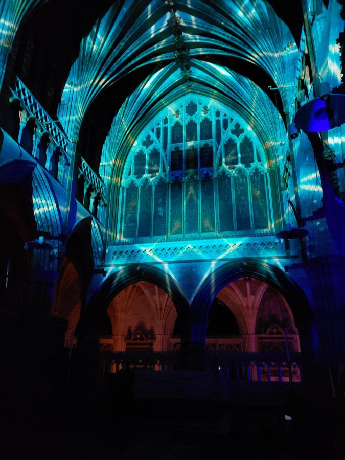 Exeter Cathedral interior lit up with a light show