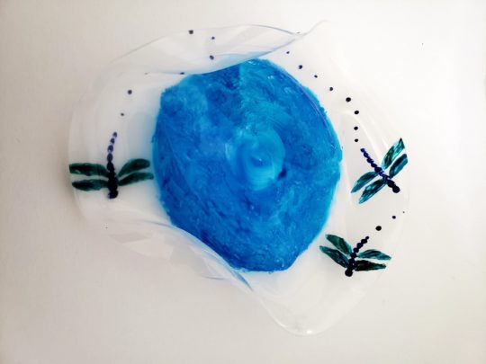 Blue dragonfly soap dish photographed from above