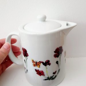 Custom teapots withy animal and floral designs